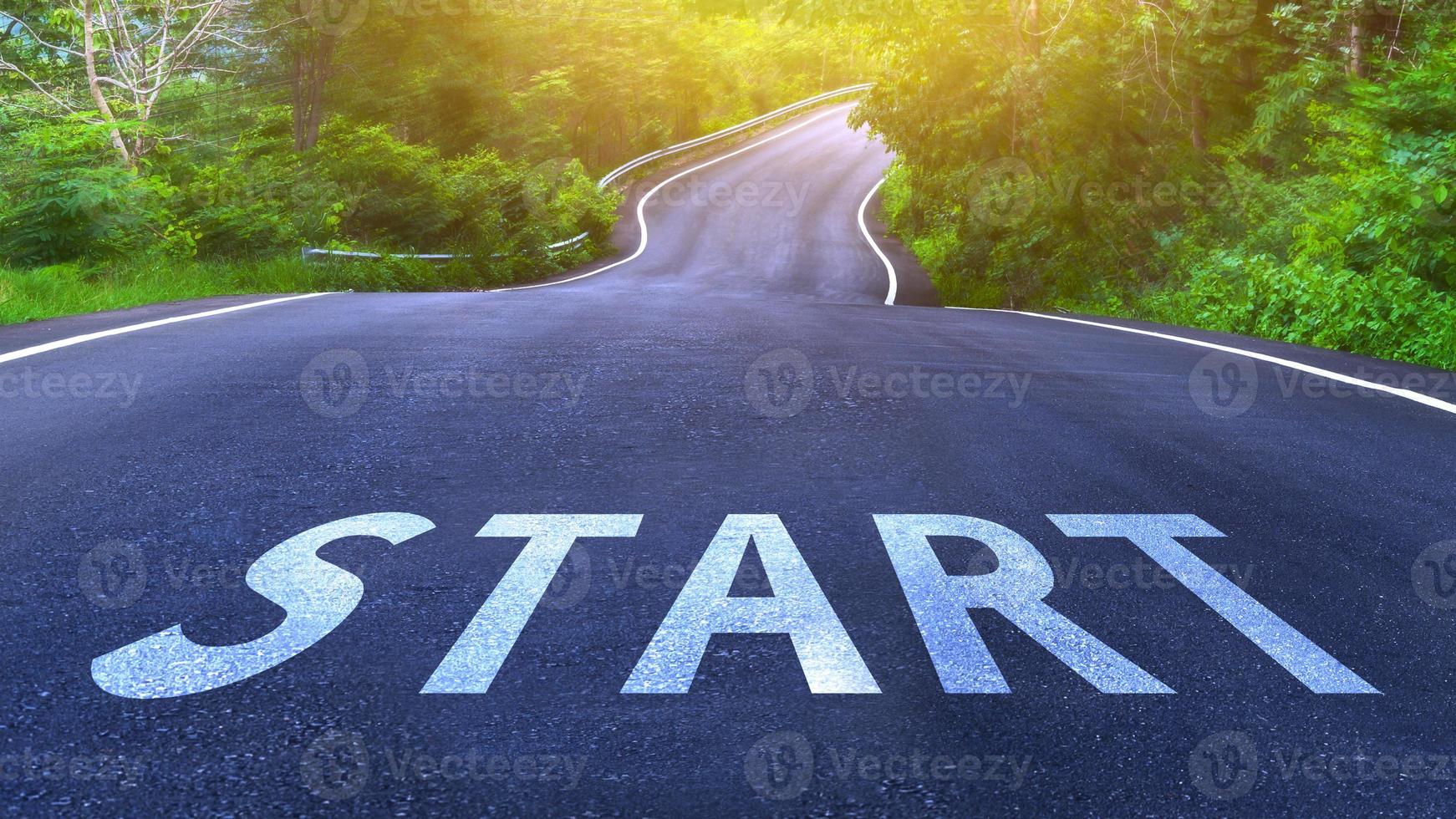 Start line on highway concept for business planning strategies and challenges or career path opportunities and change, road to success concept, start word on street photo