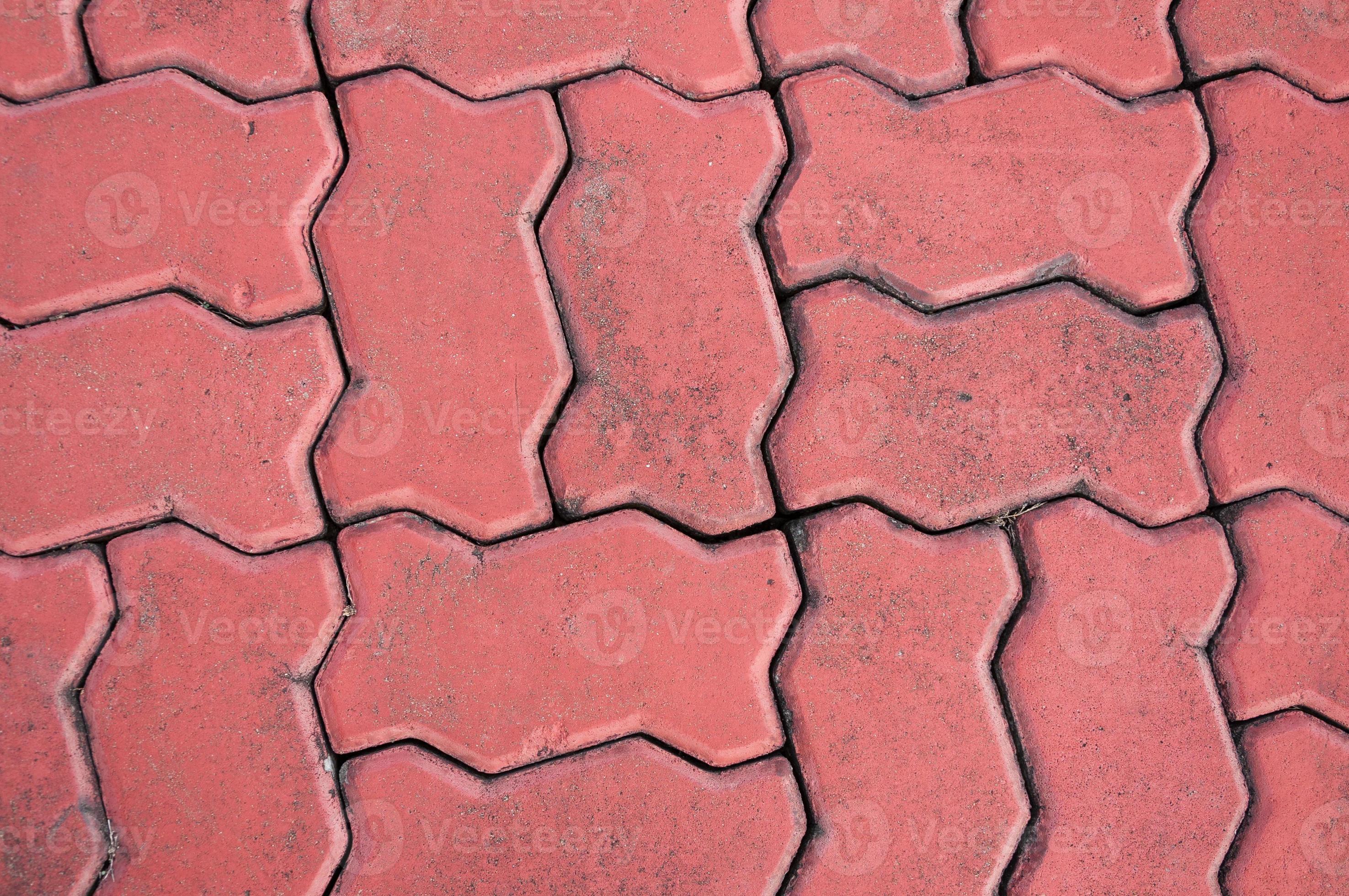 red cobblestone background,Stone paving texture. Abstract pavement