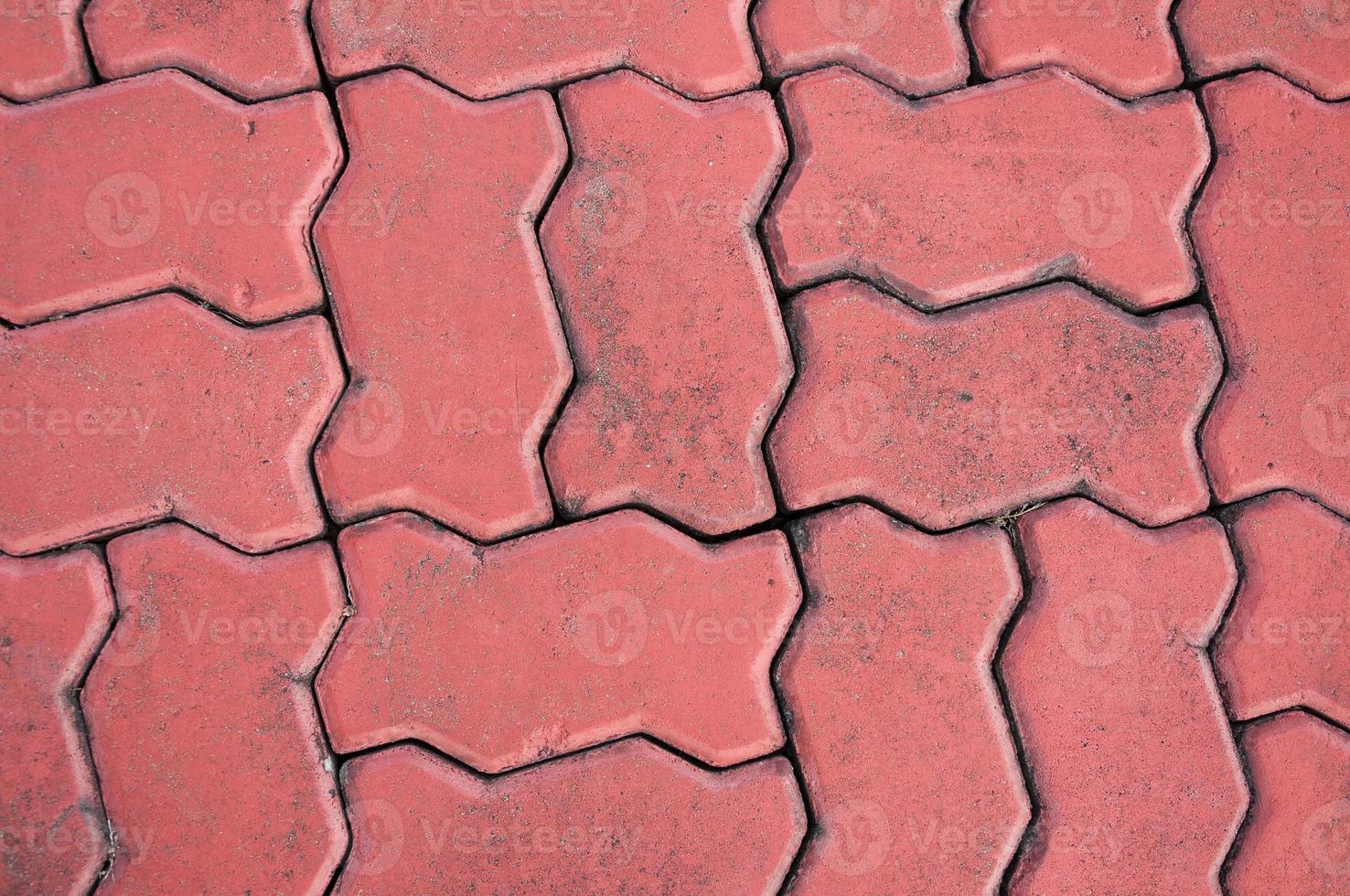 red cobblestone background,Stone paving texture. Abstract pavement