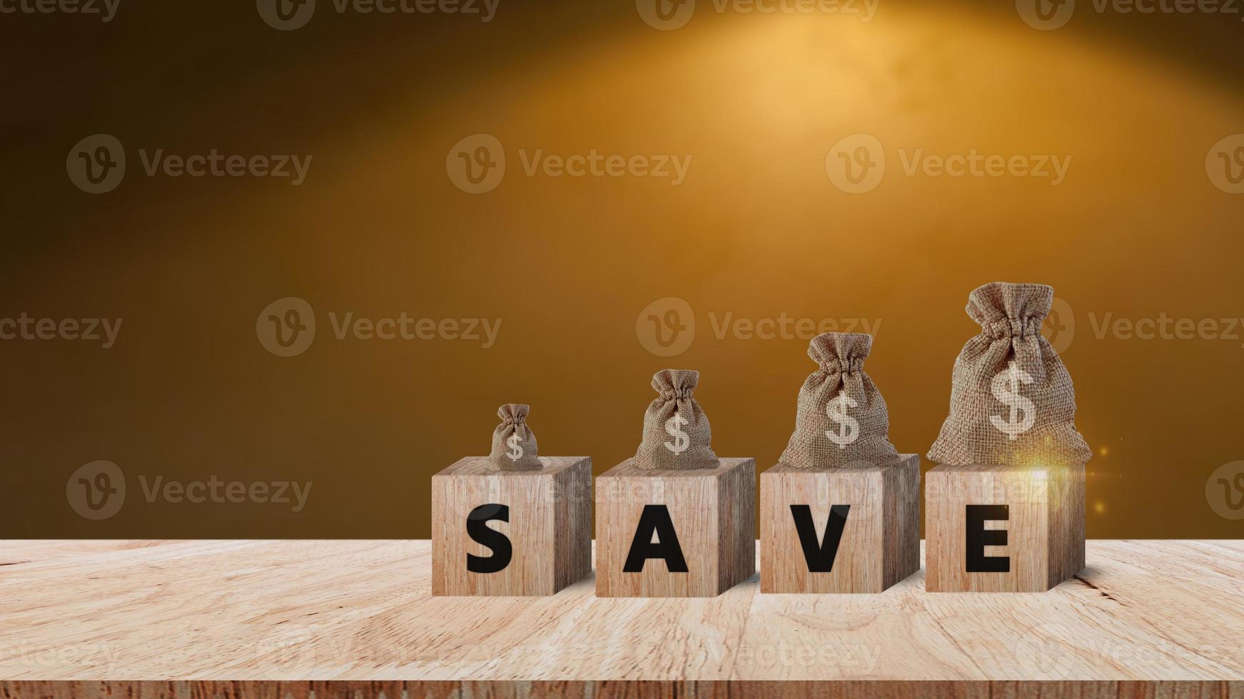 Wooden blocks with words save and money bag with Coins for investment loan planned future concept. saving, charity, family finance plan concept, fundraising, superannuation, financial crisis concept photo