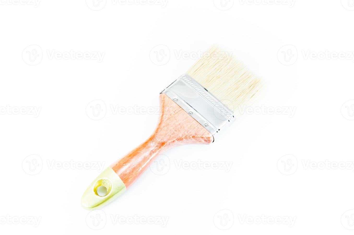 New wood paint brush on white background photo