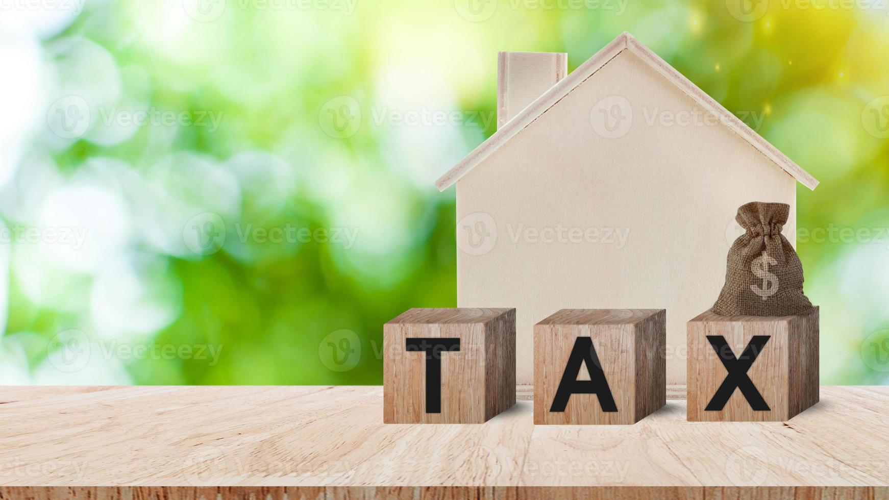 Houses and bag of taxes. Real estate tax. Taxation on purchase or sale of home, Maintenance of housing and land, Tax interest, Fees and duties, Rental business, Return on investment, Taxes relief photo