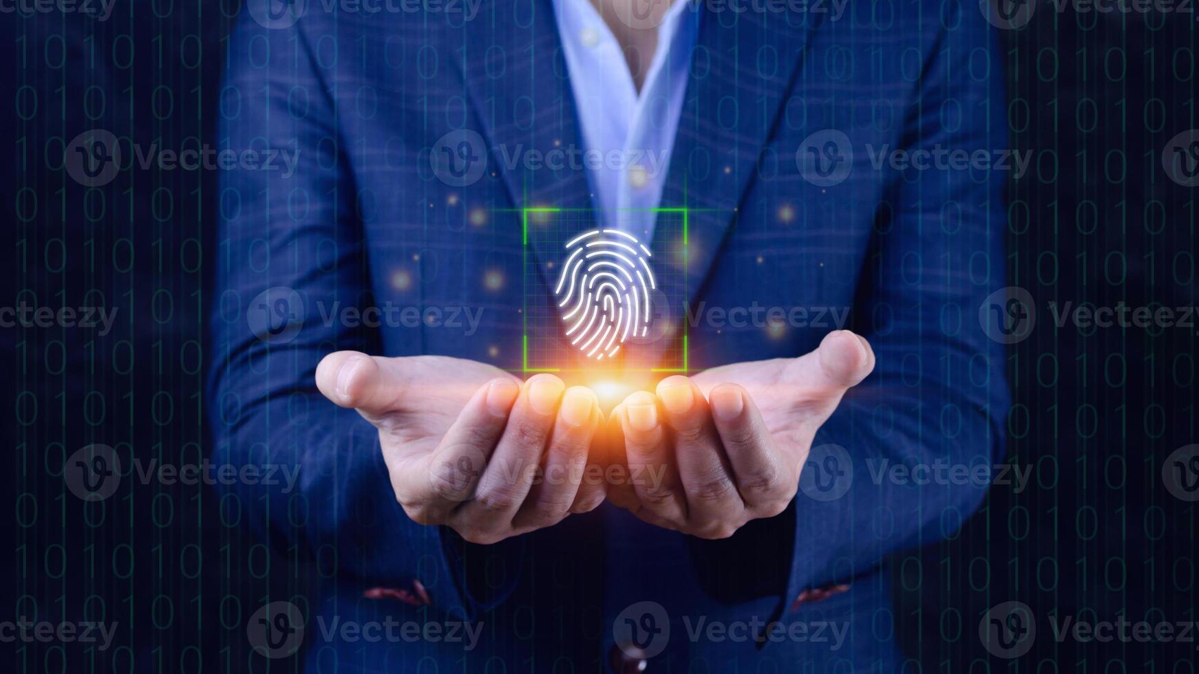 Businessman using showing scanning fingerprint, Biometric identity and authorization futuristic concept of password security and control through fingerprint in future. photo