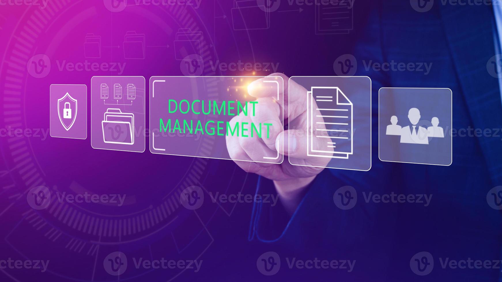 Document Management System DMS being setup IT consultant working on laptop computer in office. Software for archiving, searching and managing corporate files information photo