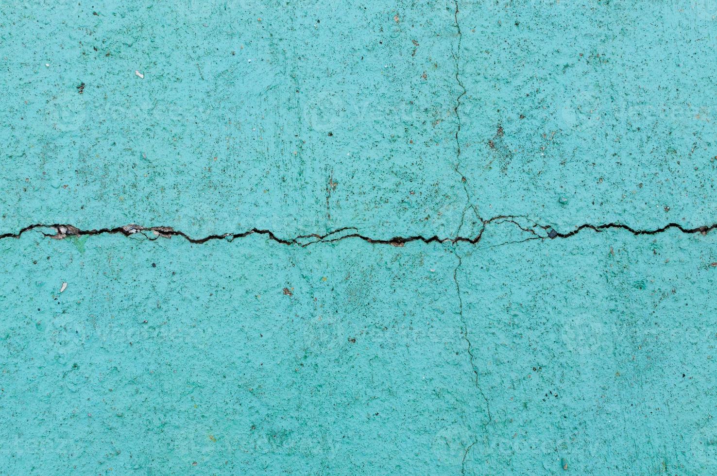 antiguo verde textura grietas cemento piso para antecedentes foto