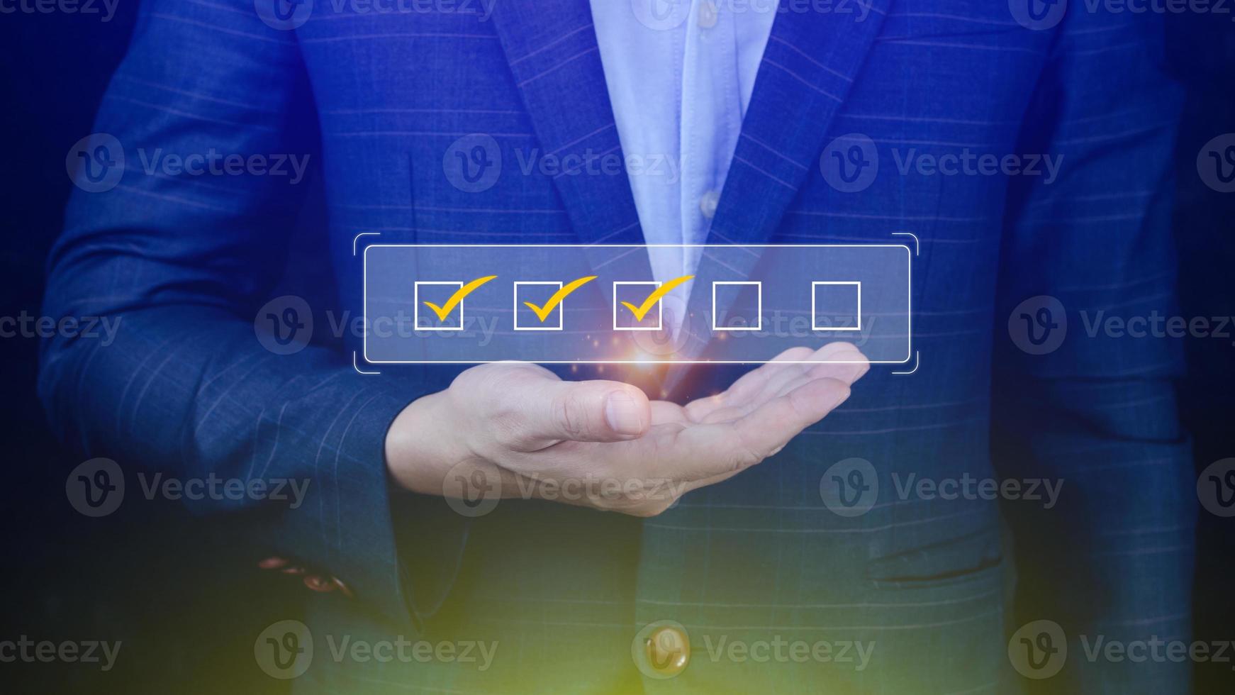 Businessman tick correct sign mark for document approve , project acceptance and quality assurance concept, take an assessment, questionnaire, evaluation, online survey online exam check list photo