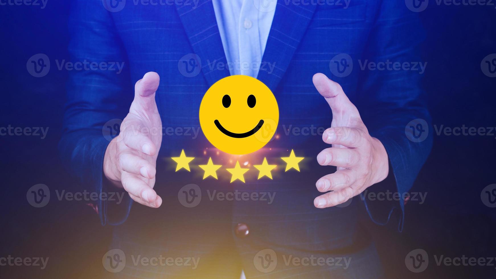 Customer services best excellent business rating experience, Positive Review and Feedback, Satisfaction survey concept. Hand of a businessman show happy smile face with five star. photo