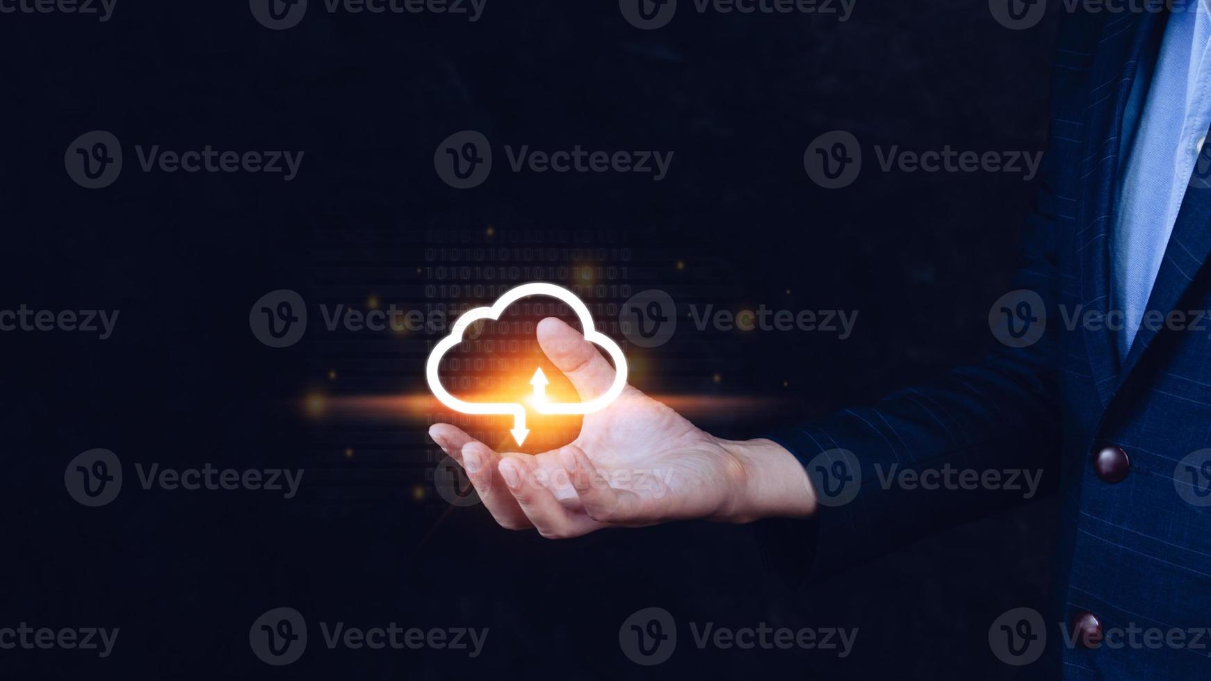 Businessman holding and giving virtual cloud icon computing with copy space to transfer data information and upload download application. technology transformation concept.Big data Concept photo