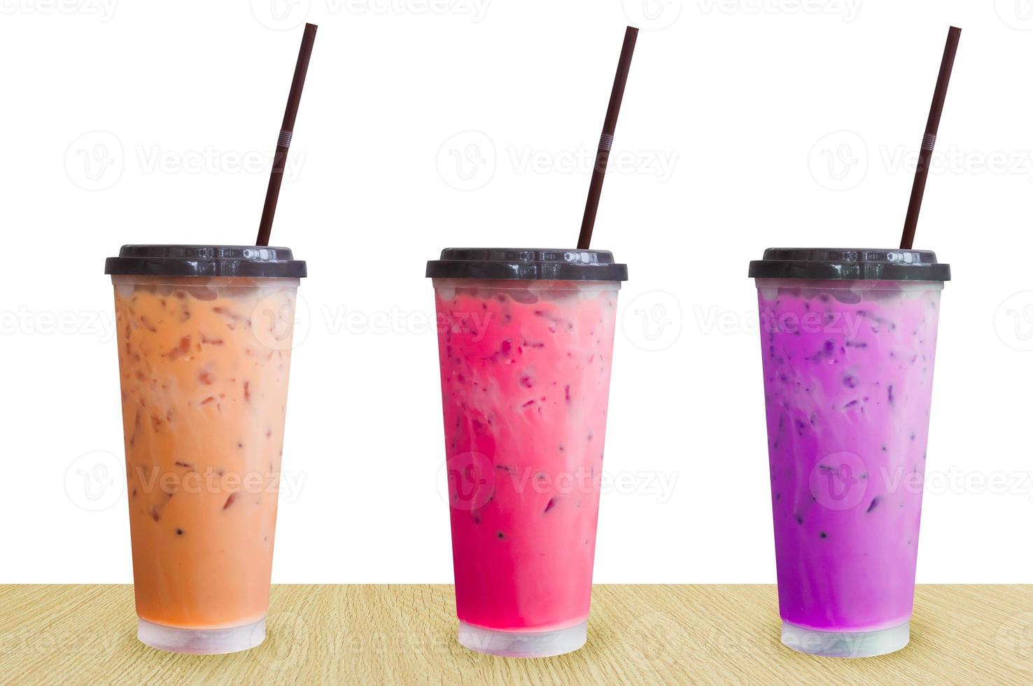 fresh sweet water colourful bright and ice in plastic glass isolated on white background,Summer drinks with ice on white background photo