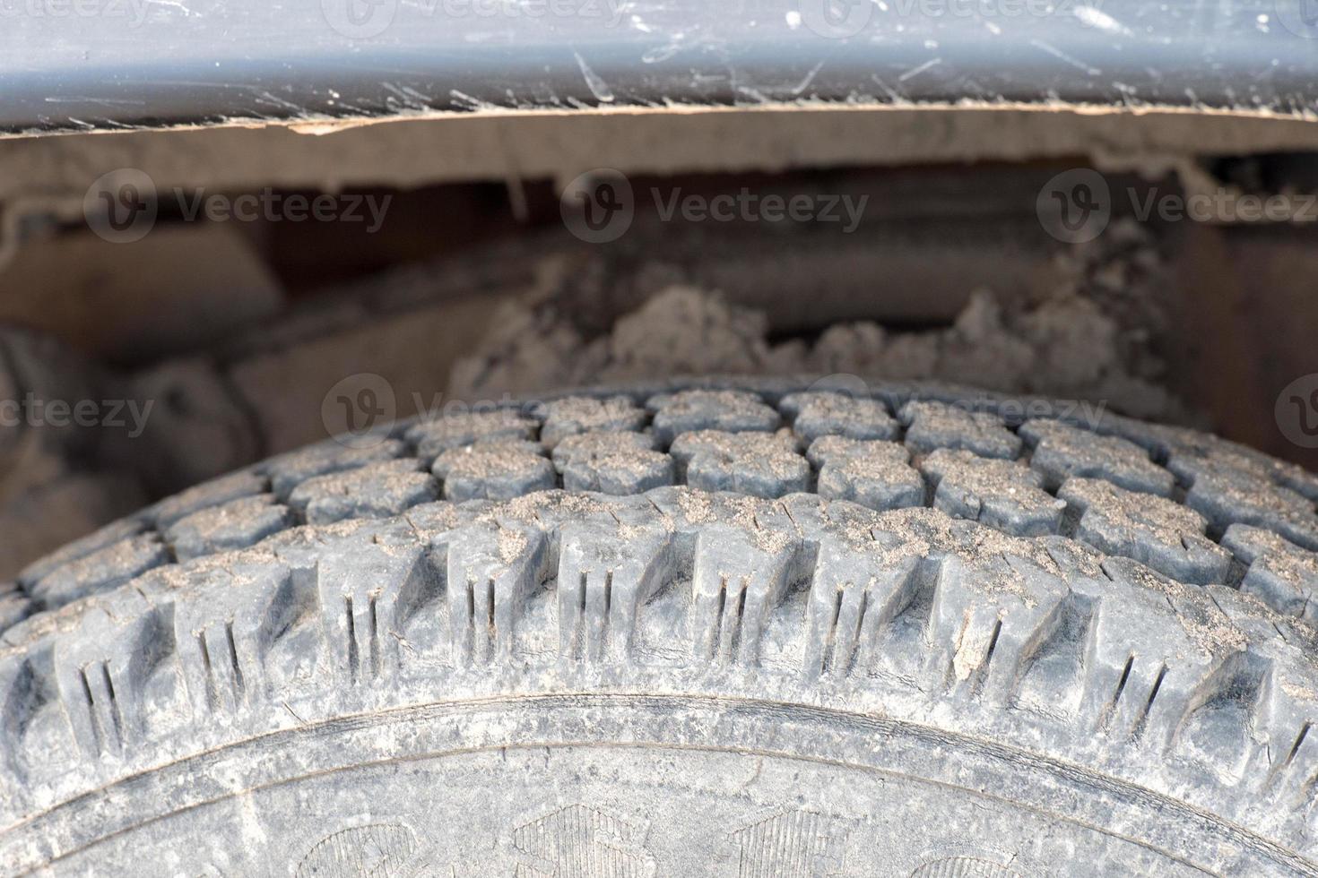 dirty car jeep tire detail photo