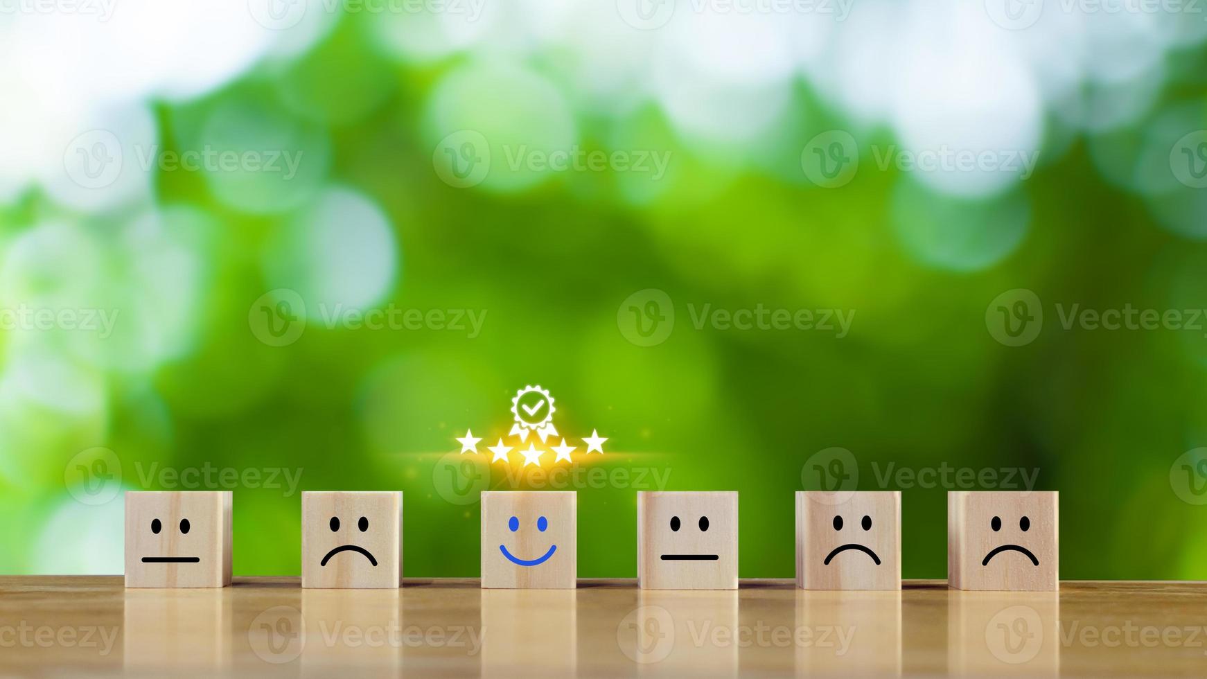 Customer service evaluation and satisfaction survey service rating concepts. wooden block cube with happy face smile face, ISO certification and standardization concept. photo