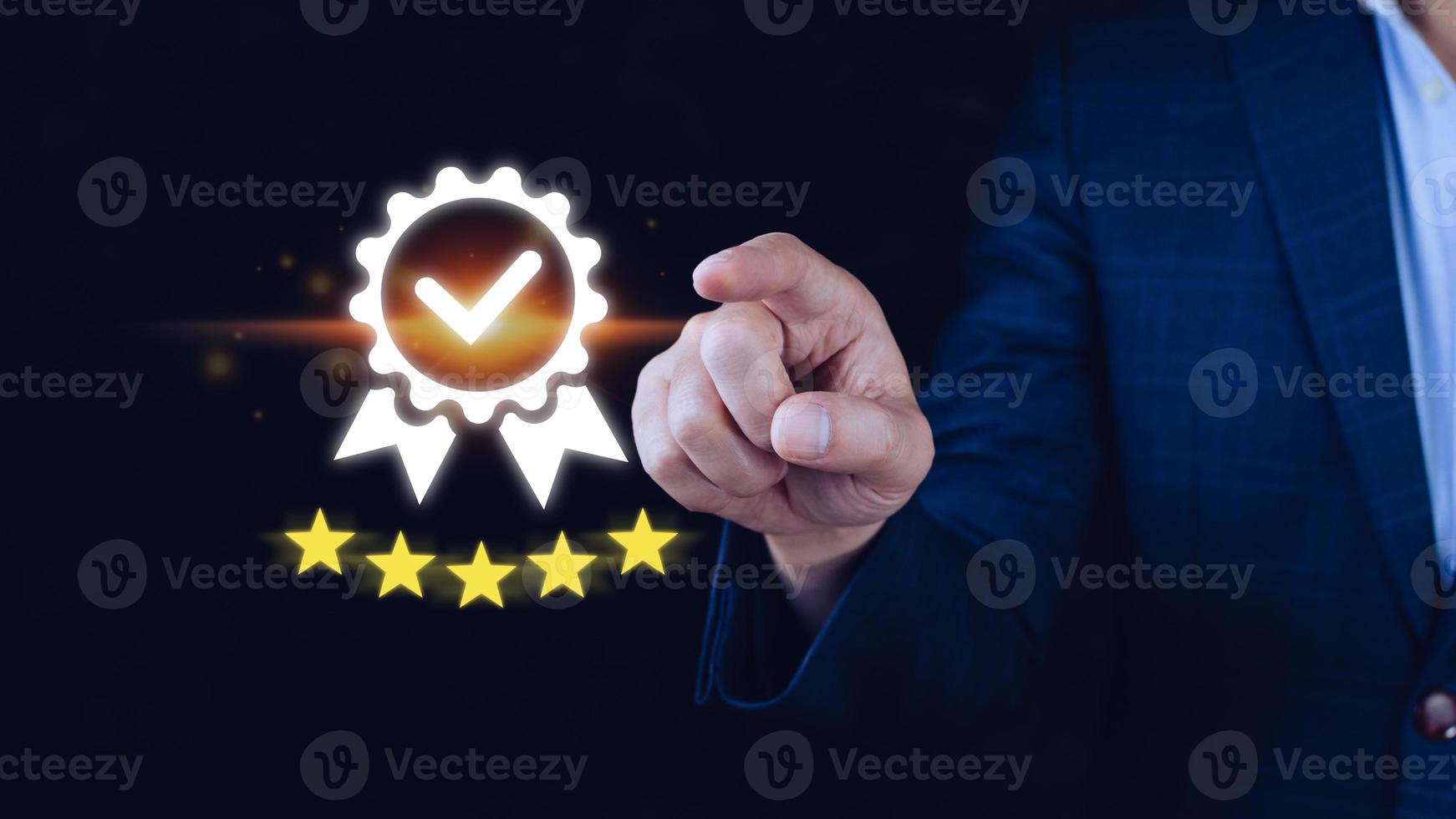 Businessman hand touching to symbol of the top service Quality assurance 5 star, Guarantee, best product, Standards, ISO certification and standardization concept. photo