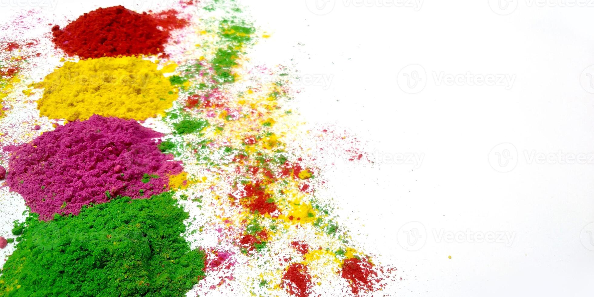 happy holi indian festival gulal on white background, holi powder decoration photo