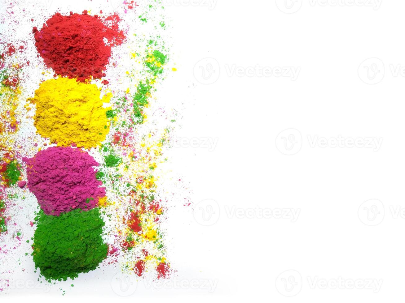 top view holi powders on white background, indian holi festival abir powder decoration photo