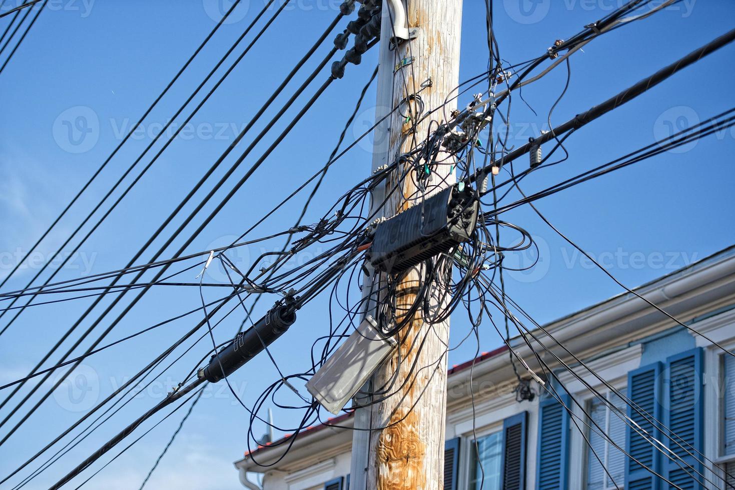 Electric cables tangle on wood post 20340990 Stock Photo at Vecteezy