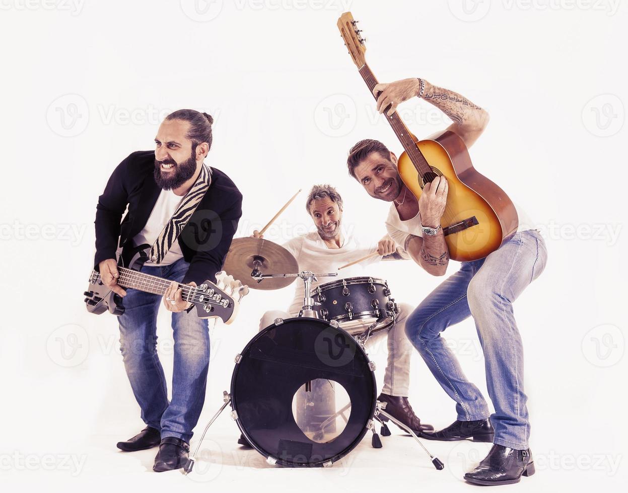 rock band performing in a studio photo