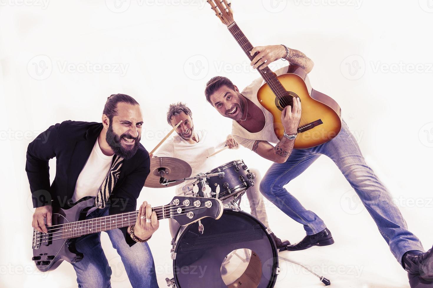 rock band performing in a studio photo