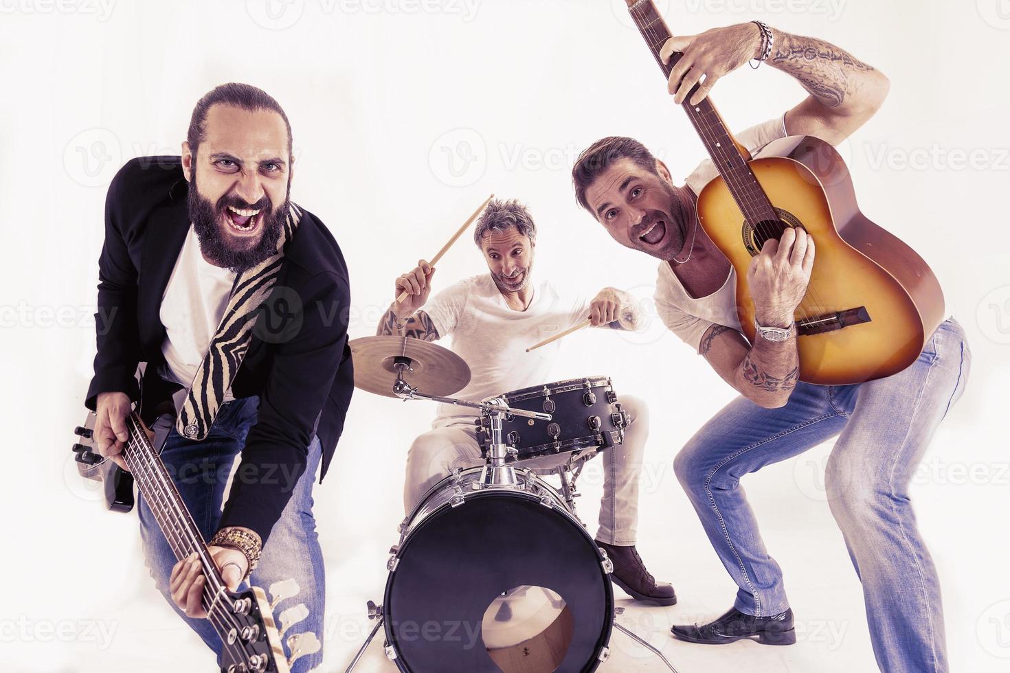 rock band performing in a studio photo