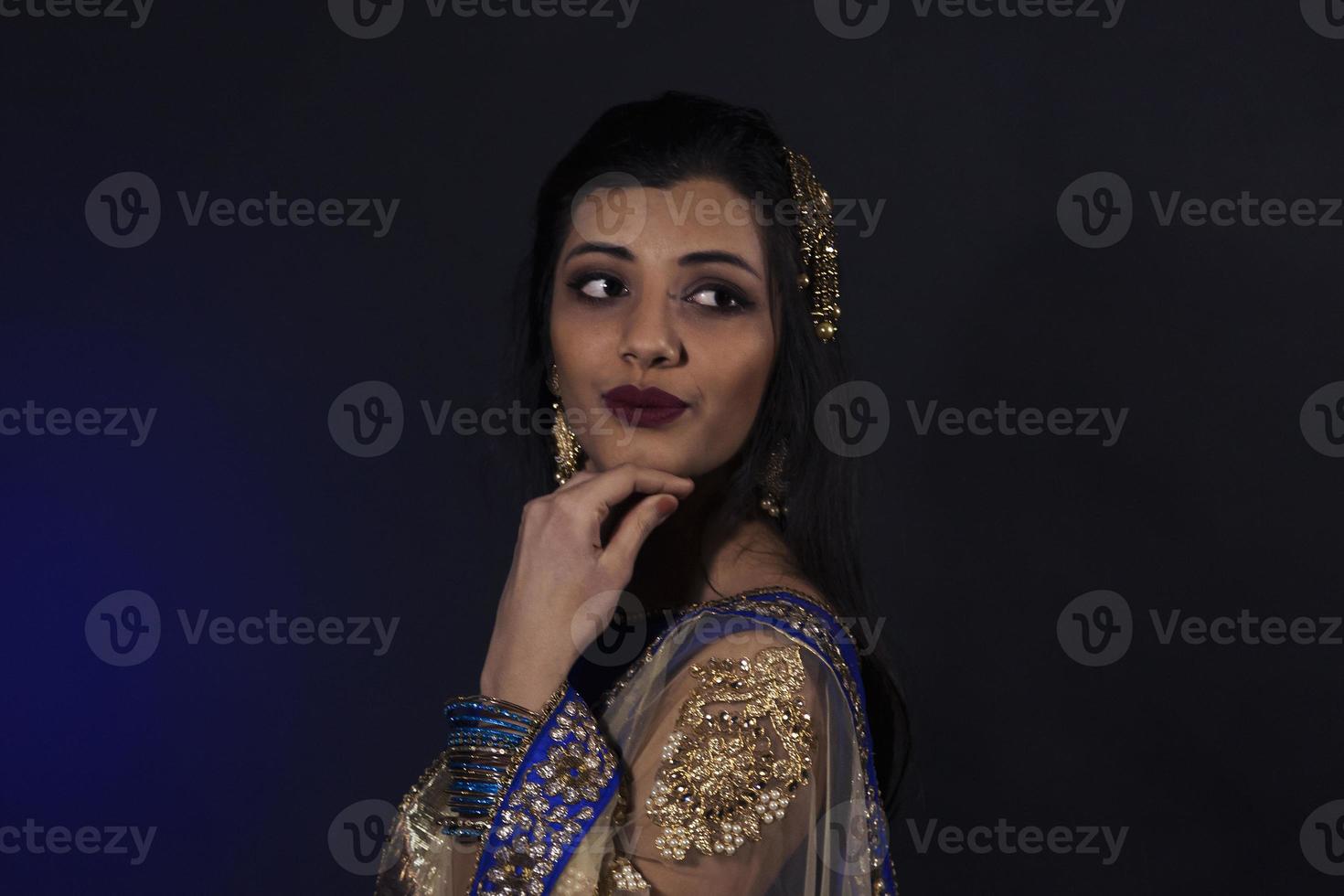 Portrait of smiling beautiful indian girl. photo