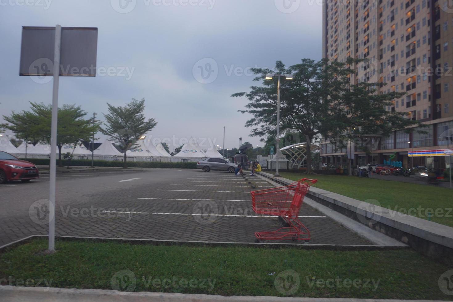 An abandoned trolly in the middle of an outdoor park photo