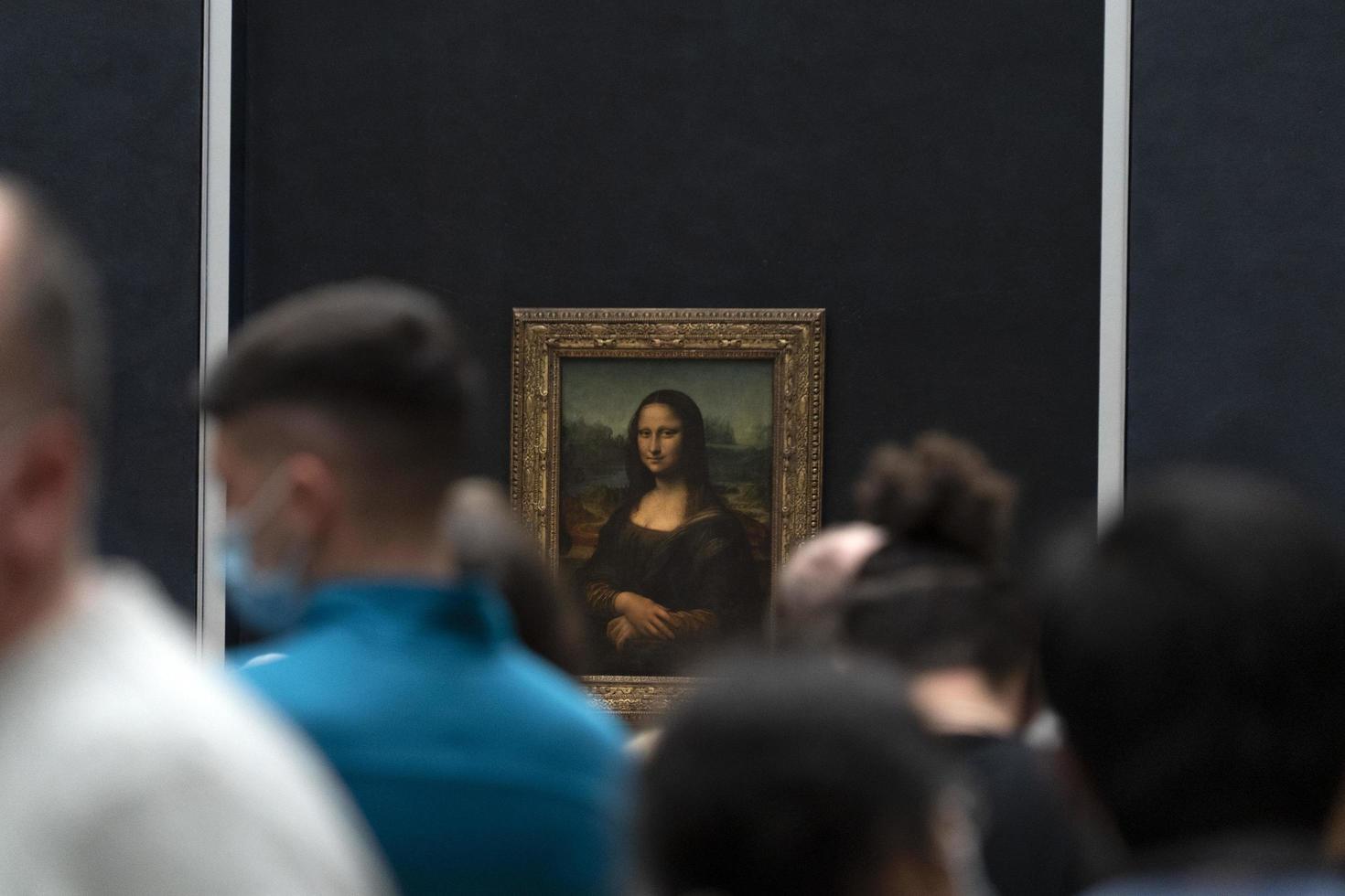 PARIS, FRANCE - NOVEMBER 18 2021 - Mona Lisa room is crowded of people photo