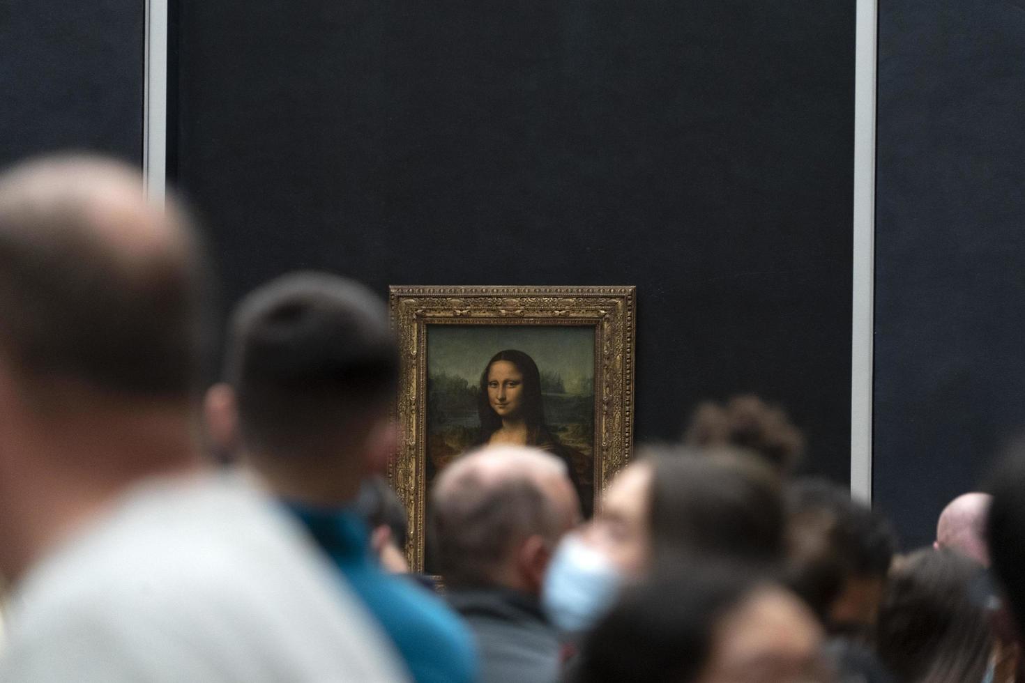 PARIS, FRANCE - NOVEMBER 18 2021 - Mona Lisa room is crowded of people photo