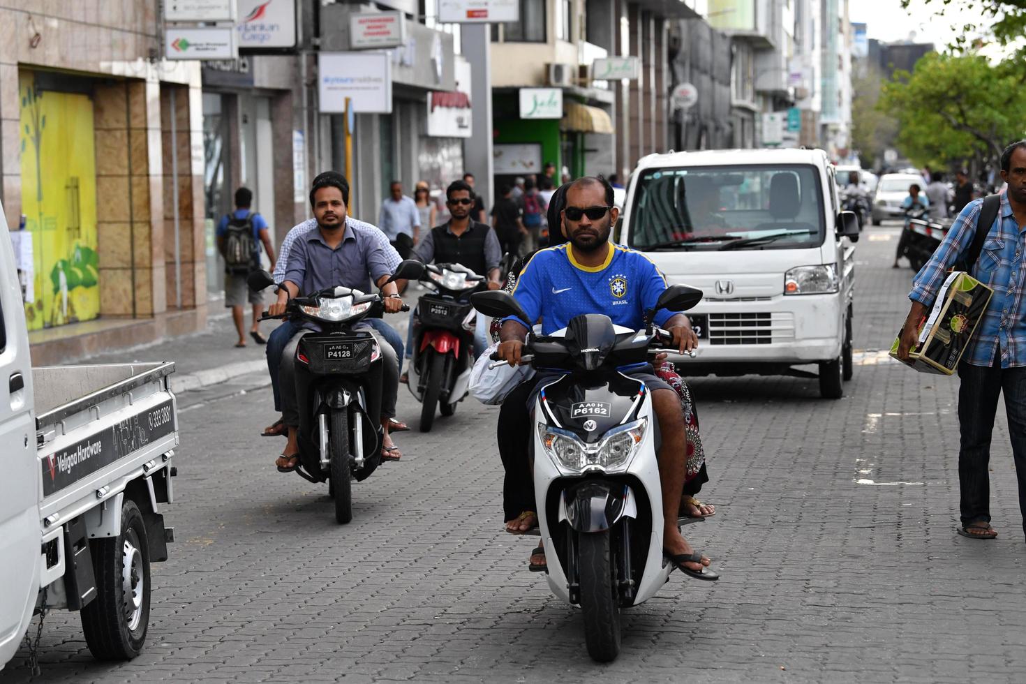 MALE, MALDIVES - MARCH, 4 2017 - Heavy traffic in the street before evening pray time photo