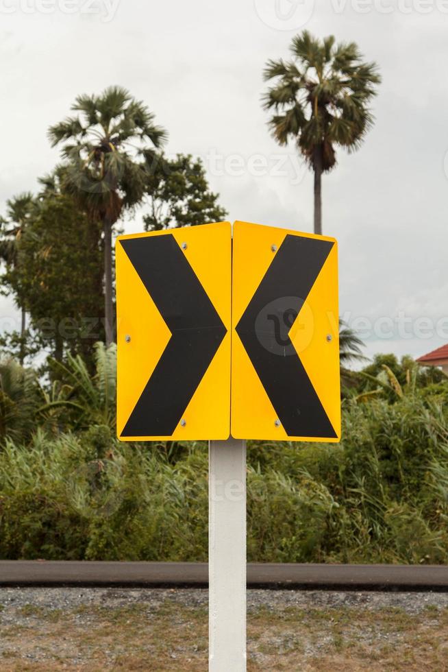 Traffic signs Be careful of roads and curves. Drive slowly and be careful of the curves ahead on rural highways and beautiful blue skies. photo