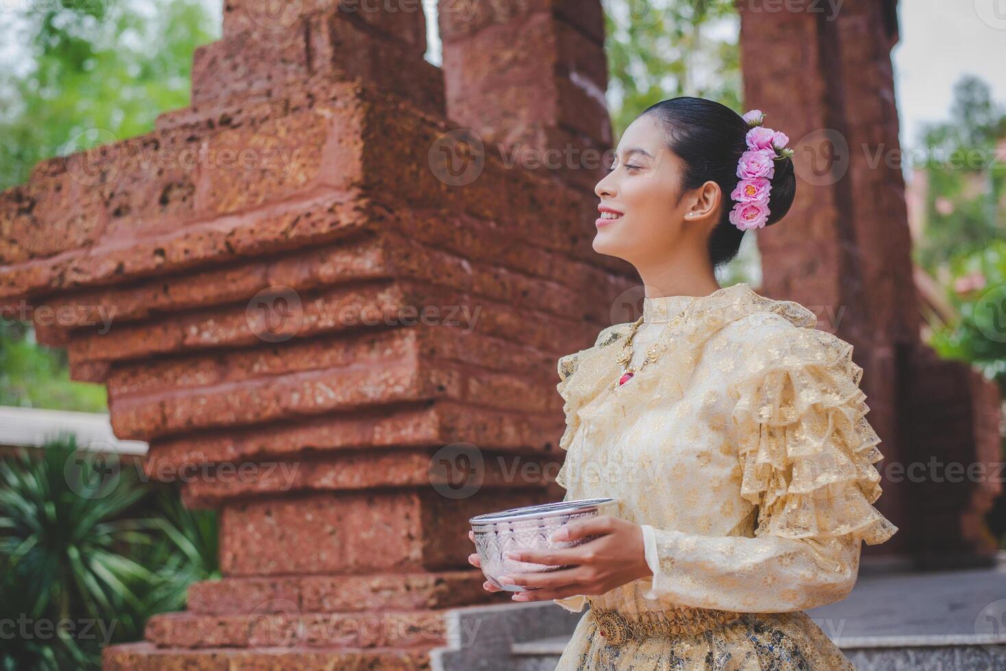 Portrait beautiful woman in Songkran festival with Thai Traditional costume photo