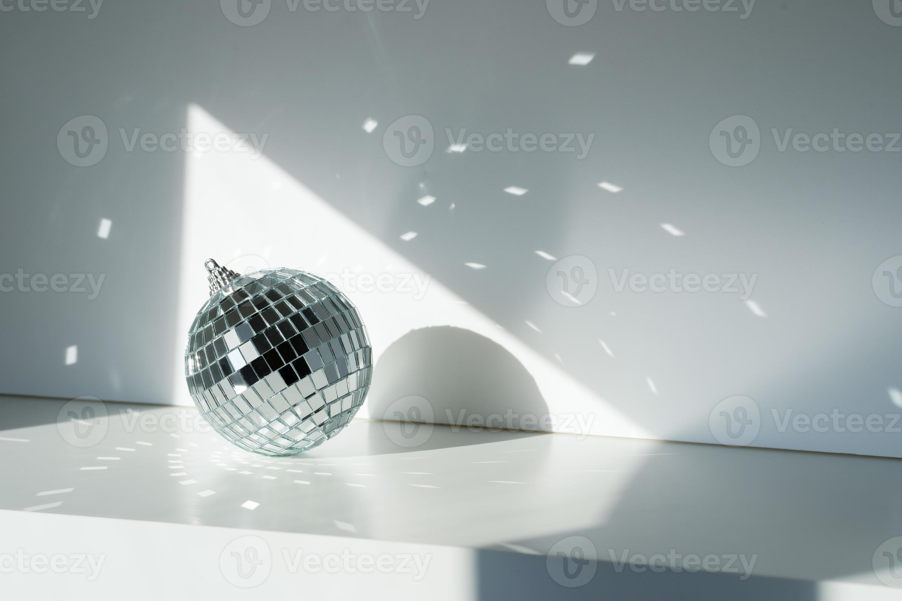 Disco ball in sunlight on white background 20383316 Stock Photo at Vecteezy
