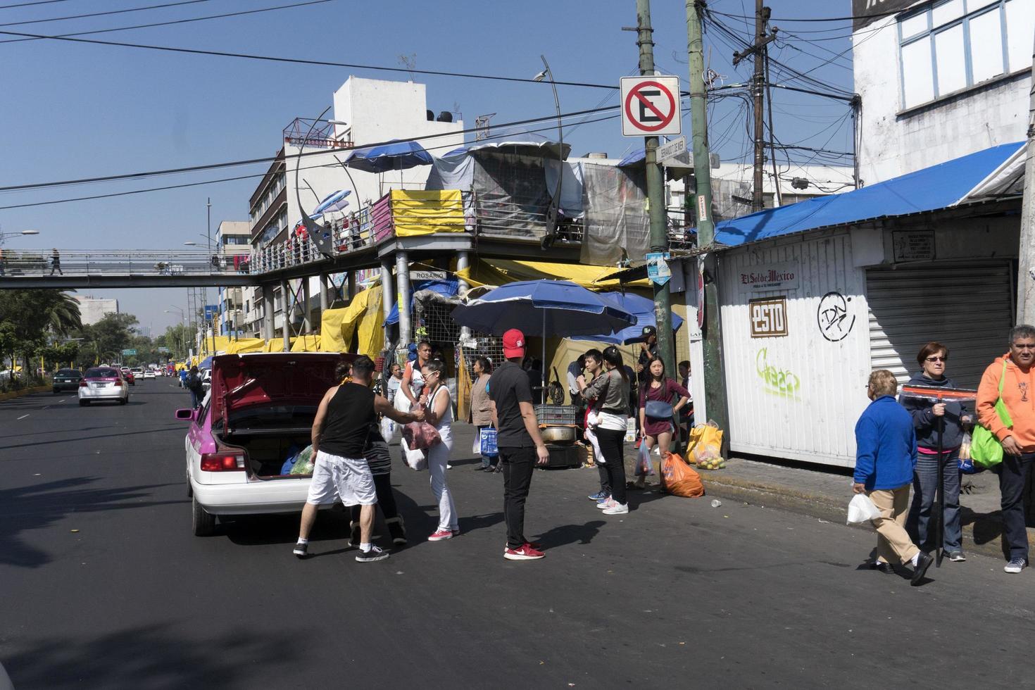 MEXICO CITY, MEXICO - NOVEMBER 5 2017 - People at town street market photo