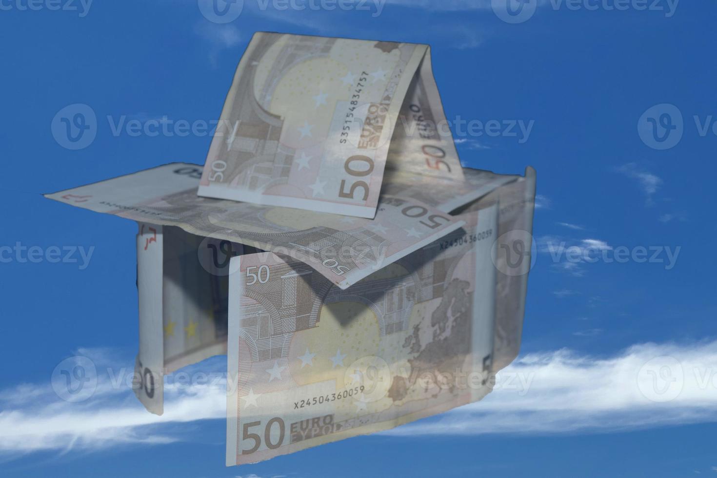 Euro paper money castle in the sky background photo