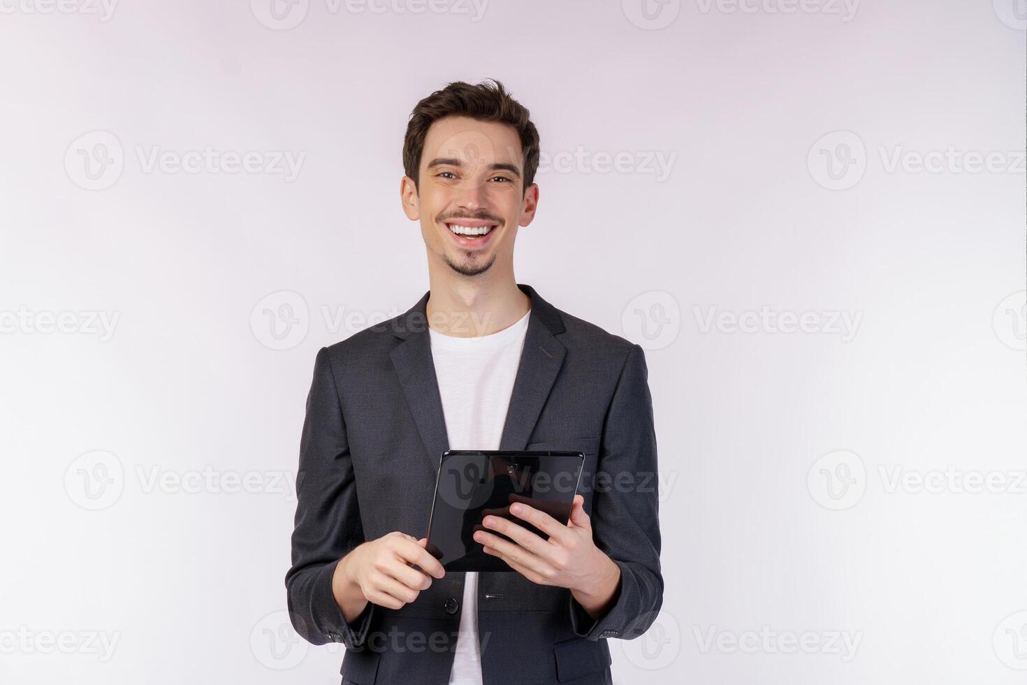 Portrait of attractive cheerful businessman using device app searching web isolated over white color background photo