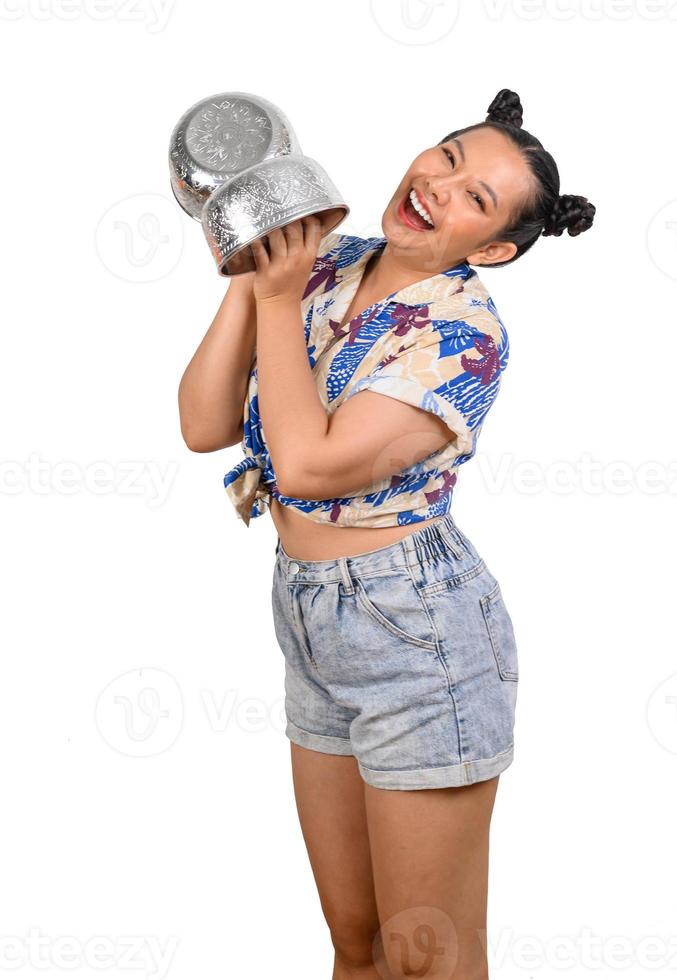 Portrait cute woman in Songkran festival with water bowl photo