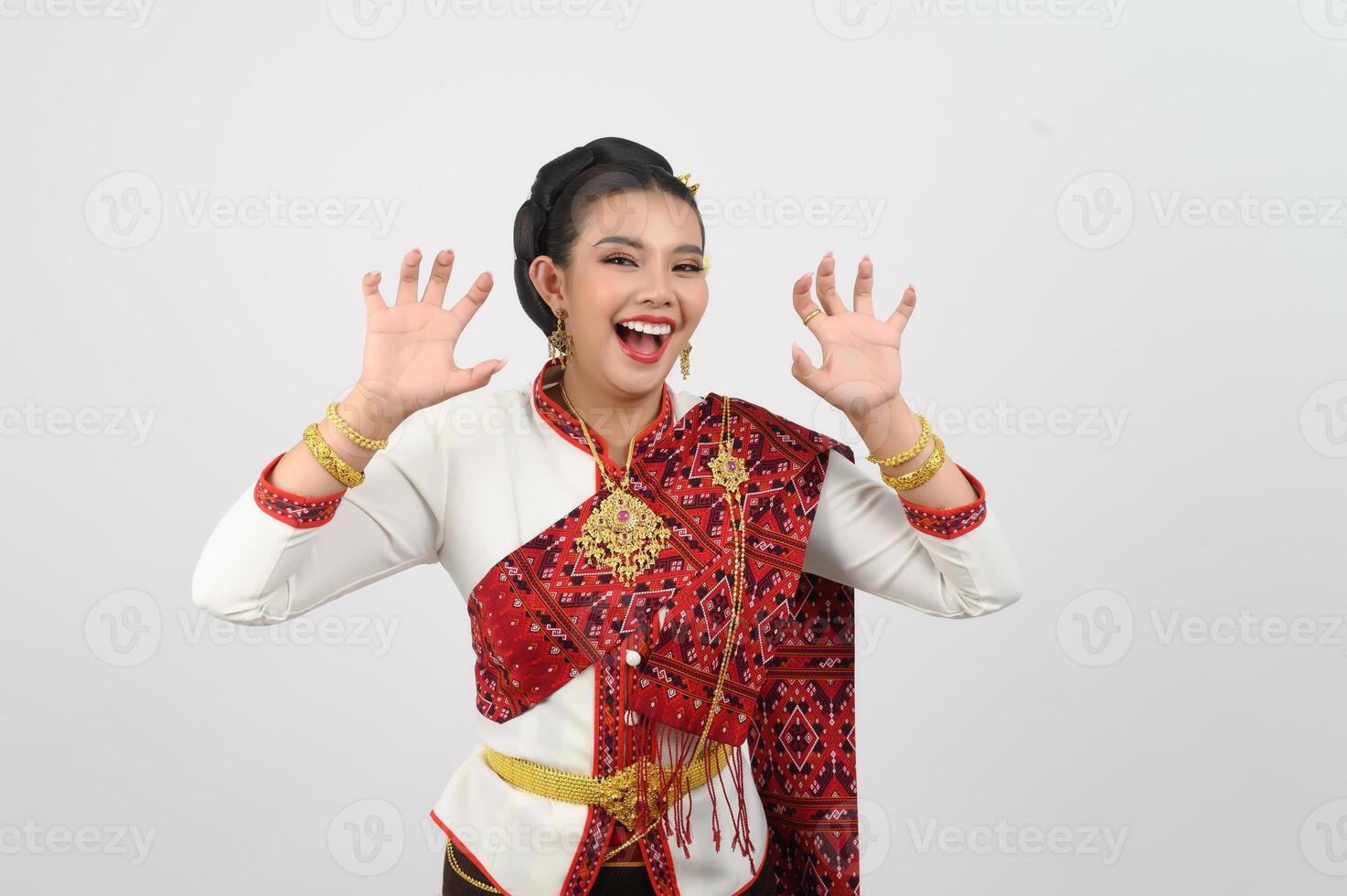 Portrait of Beautiful Thai Woman in Traditional Clothing standing Posing photo