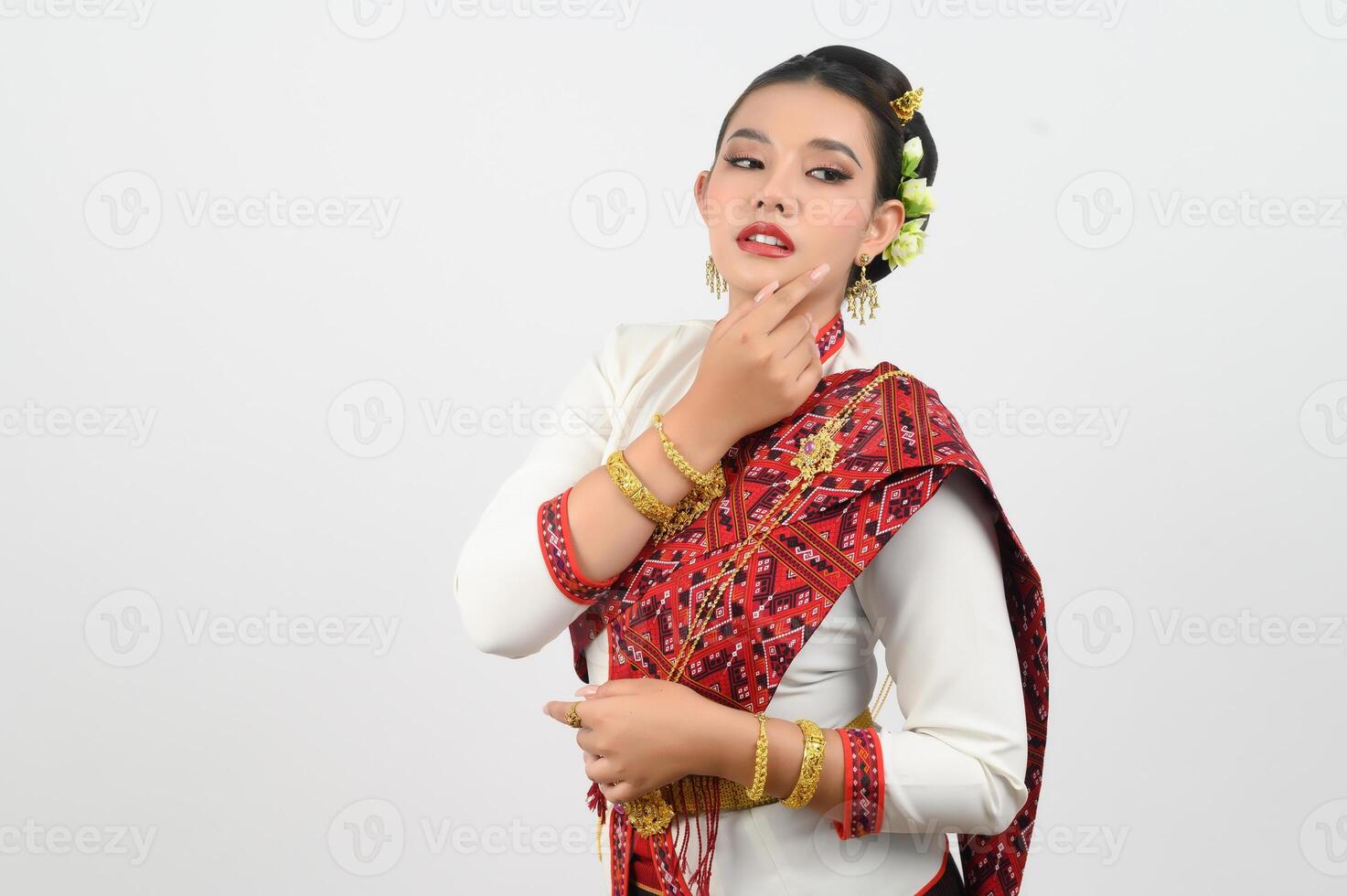 Portrait of Beautiful Thai Woman in Traditional Clothing standing Posing photo