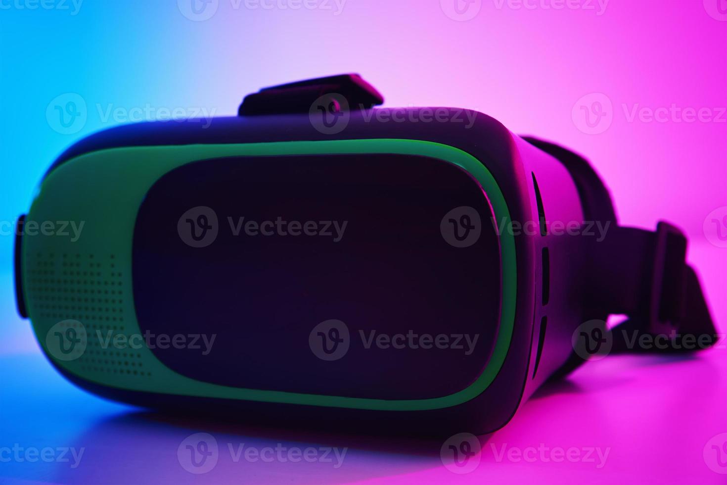 Virtual reality glasses on colorful background. Future technology, VR concept photo