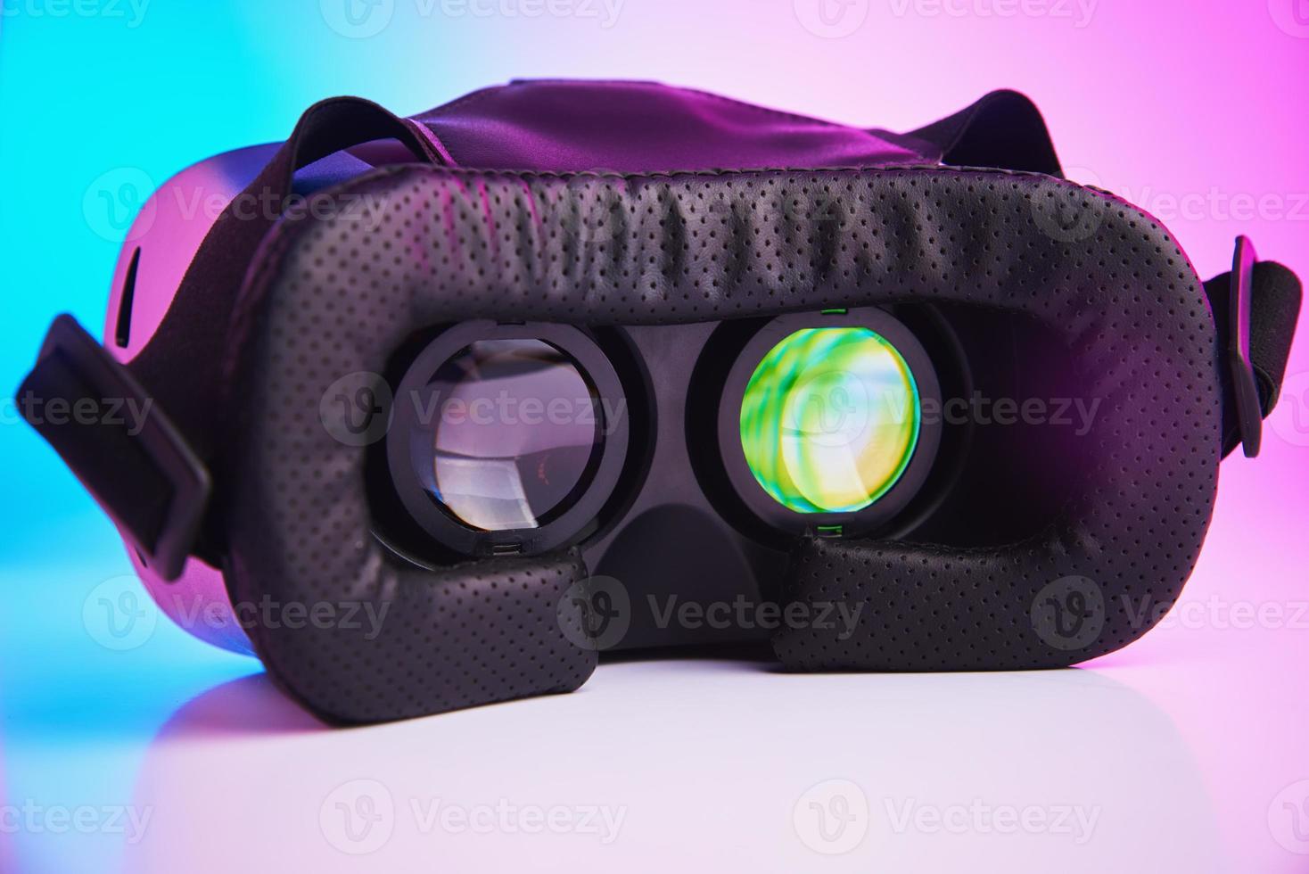 Virtual reality glasses on colorful background. Future technology, VR concept photo