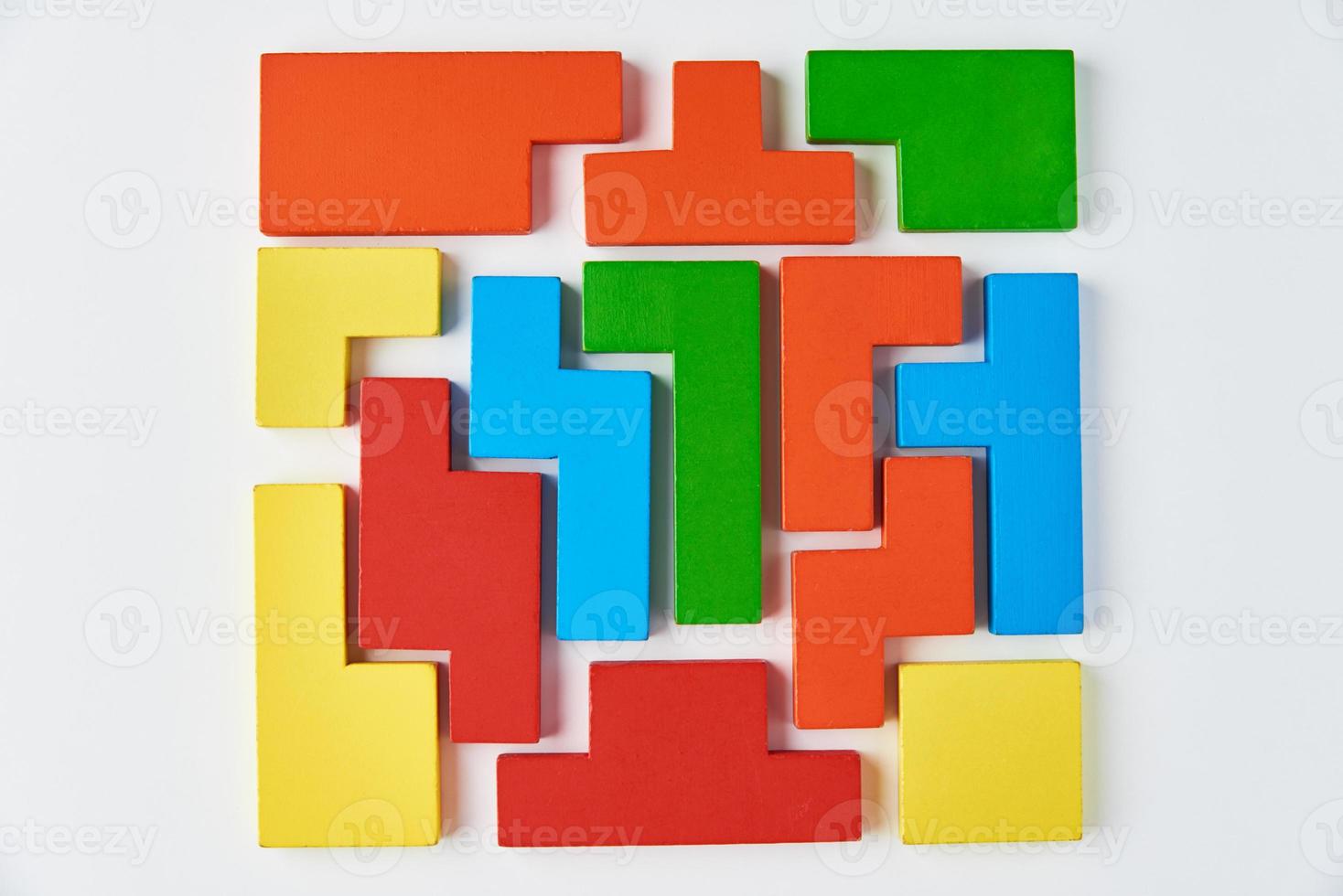 Different wooden blocks on white background. photo