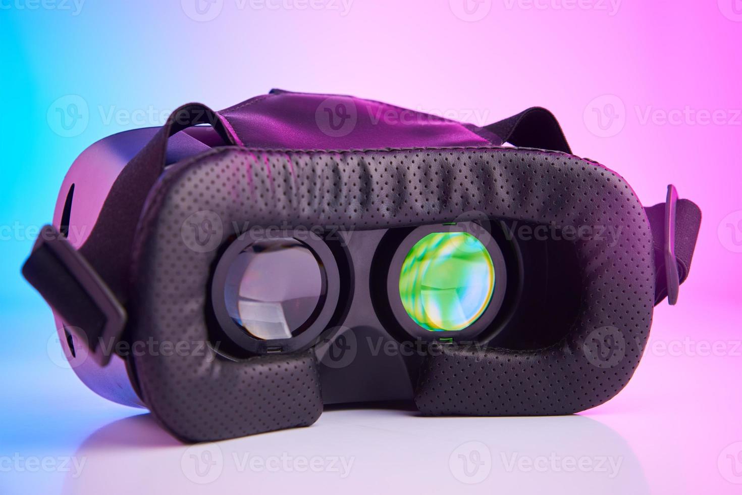 Virtual reality glasses on colorful background. Future technology, VR concept photo