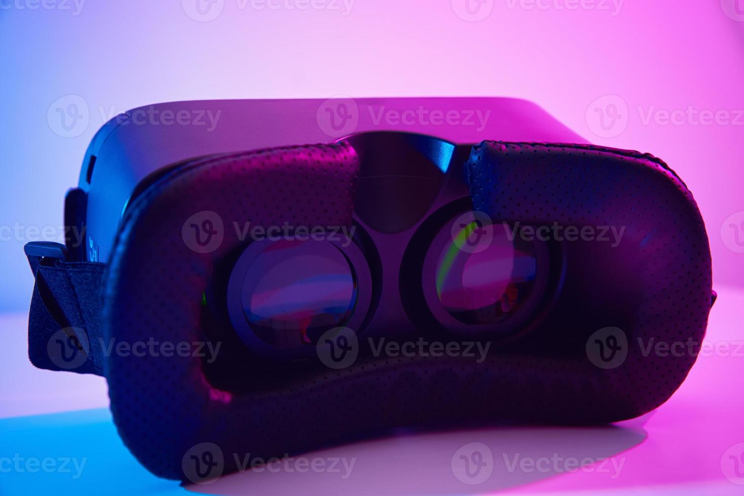 Virtual reality glasses on colorful background. Future technology, VR concept photo