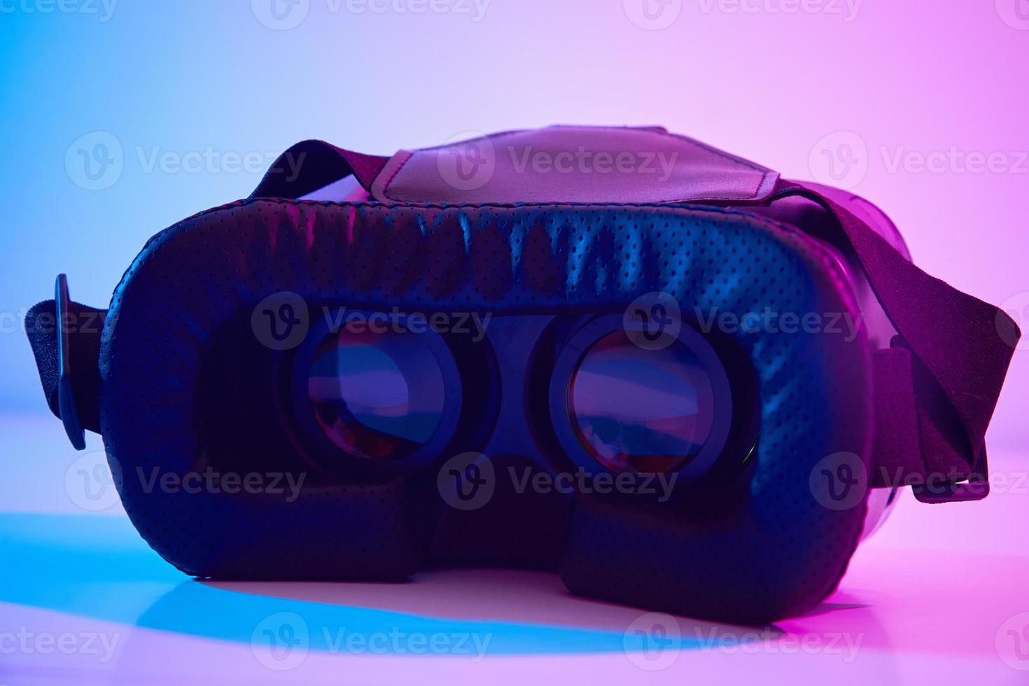 Virtual reality glasses on colorful background. Future technology, VR concept photo