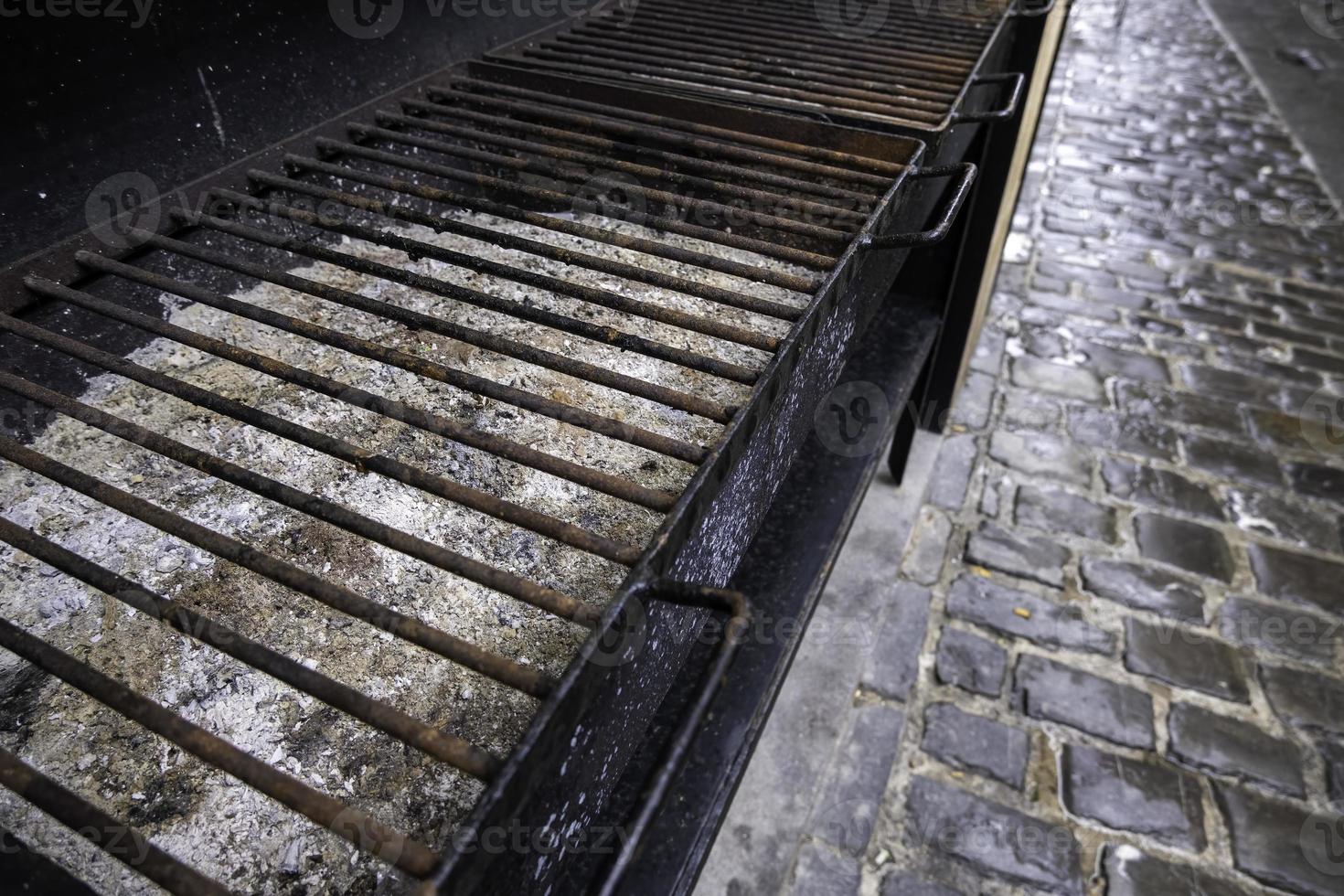 Old rusty barbecue grill photo