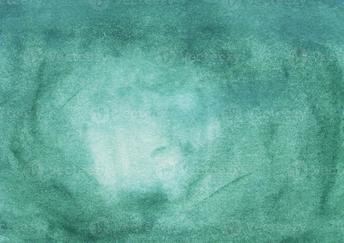 Watercolor dark sea green background texture with space for text. Aquarelle emerald abstract backdrop. photo