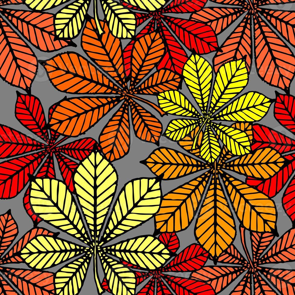 bright autumn seamless pattern of chestnut yellow and red leaves on a gray background, texture, design photo