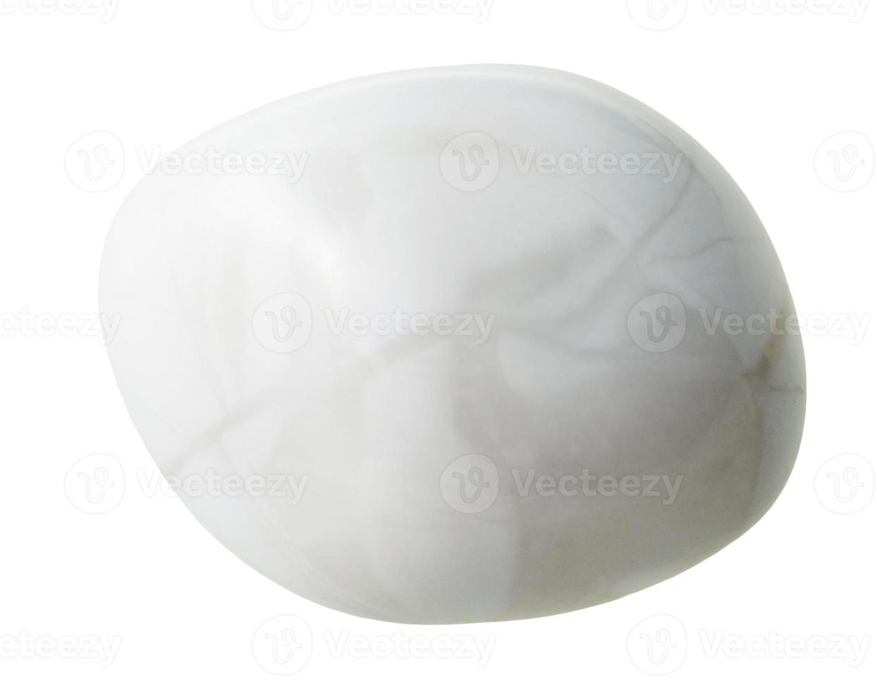 Magnesite gemstone isolated on white photo