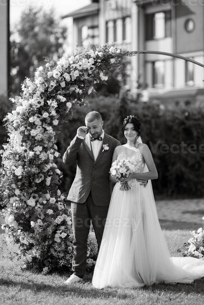 wedding ceremony of the newlyweds on the glade photo