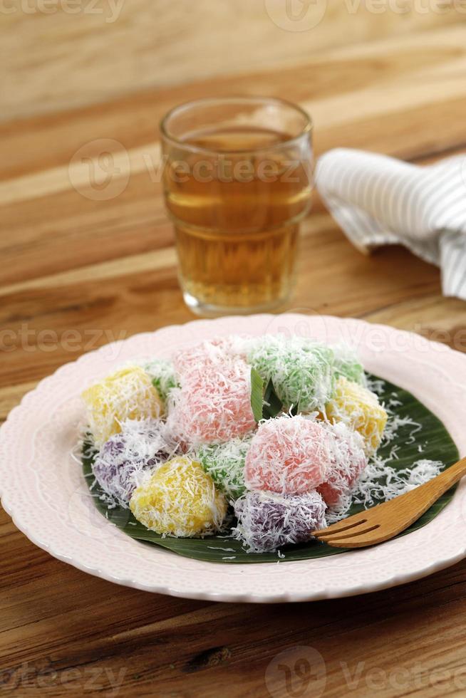 Colorful Ongol-Ongol or Sentiling, Steamed Cassava Cake photo