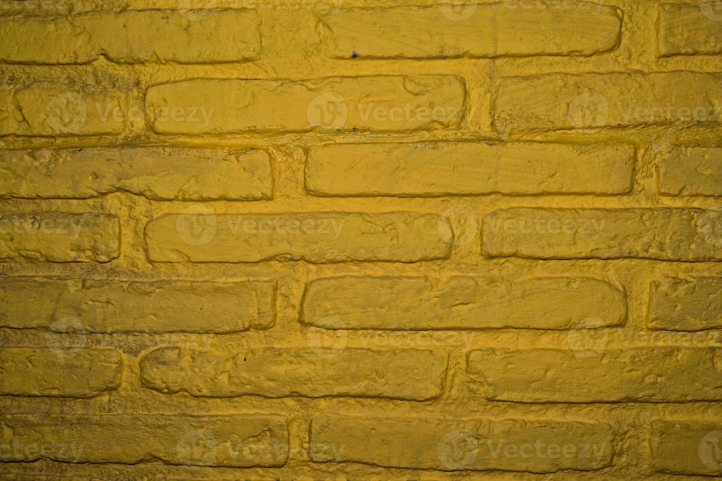 old yellow brick wall photo