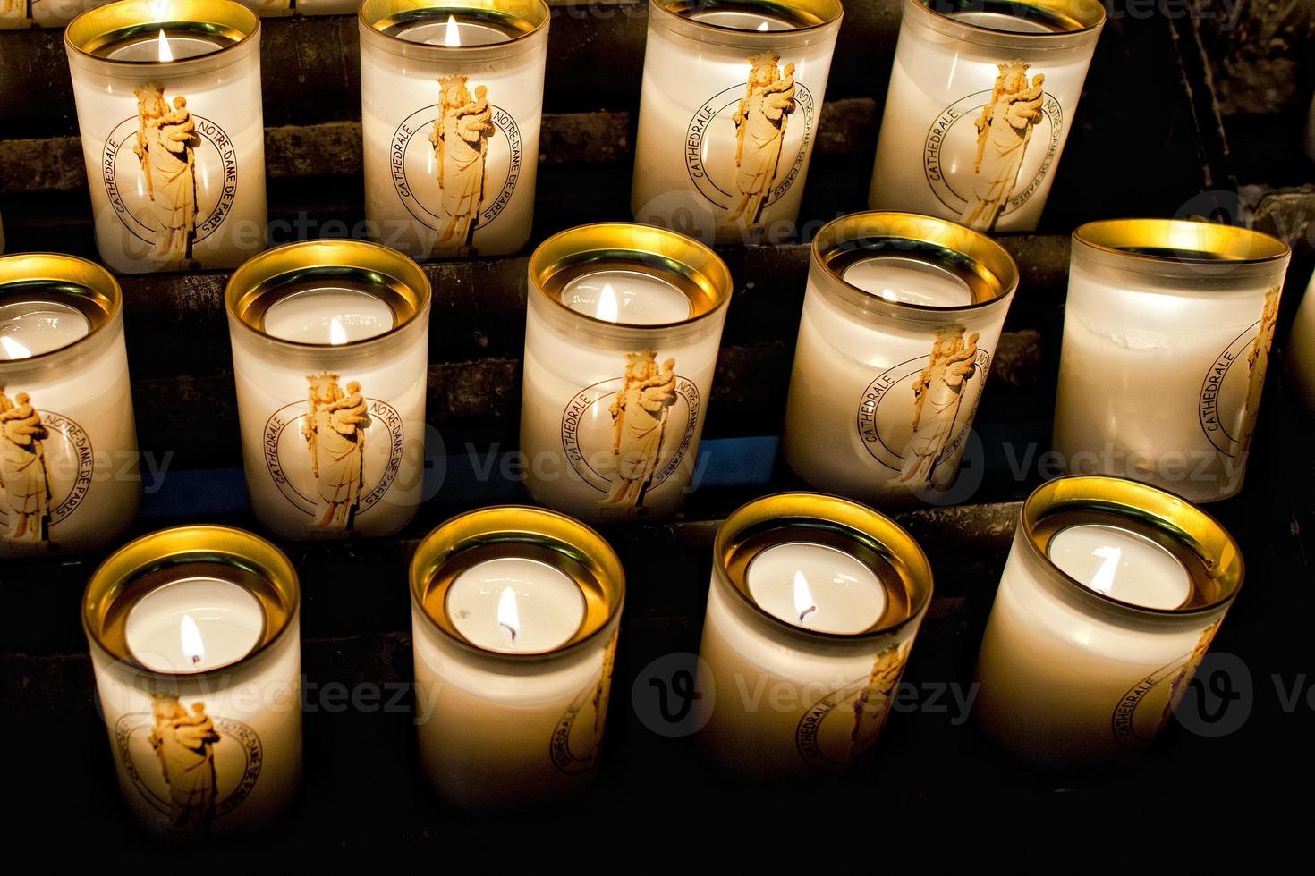 votive candles in paris cathedral 20420384 Stock Photo at Vecteezy